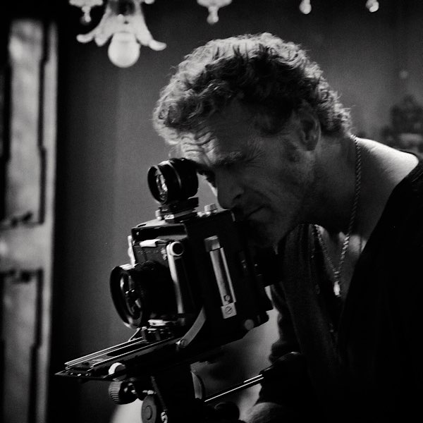 Steven Lyon working with a film camera